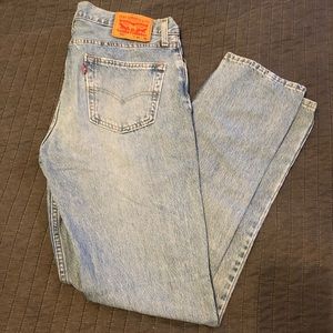 Light washed Levi’s 511s.